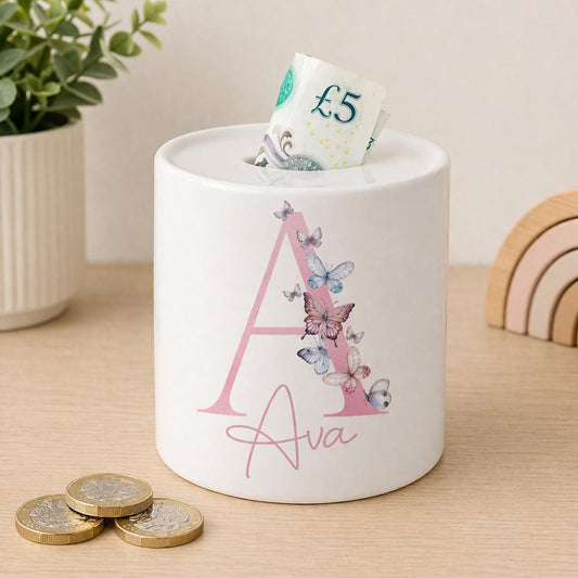 Glossy ceramic butterfly money box personalised with a child's name