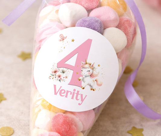 Round glossy stickers featuring a pastel unicorn with rainbow mane, personalised with a birthday child's name