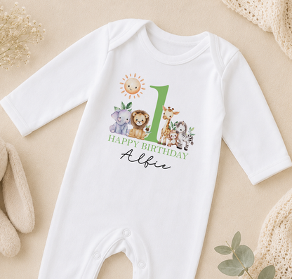 Personalised white baby vest printed with jungle animals and 'Happy Birthday Albie'.