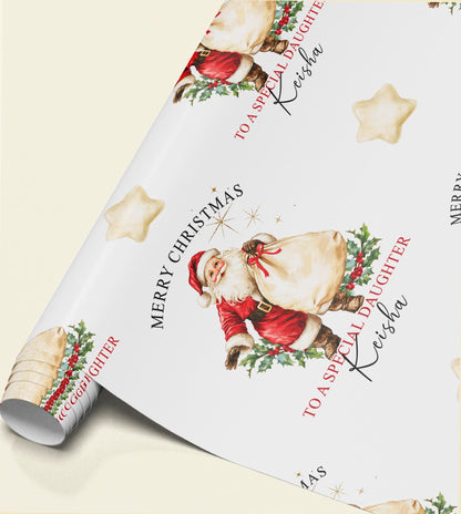 Close-up of personalised vintage Santa wrapping paper showing the repeating Father Christmas illustration and custom name detail