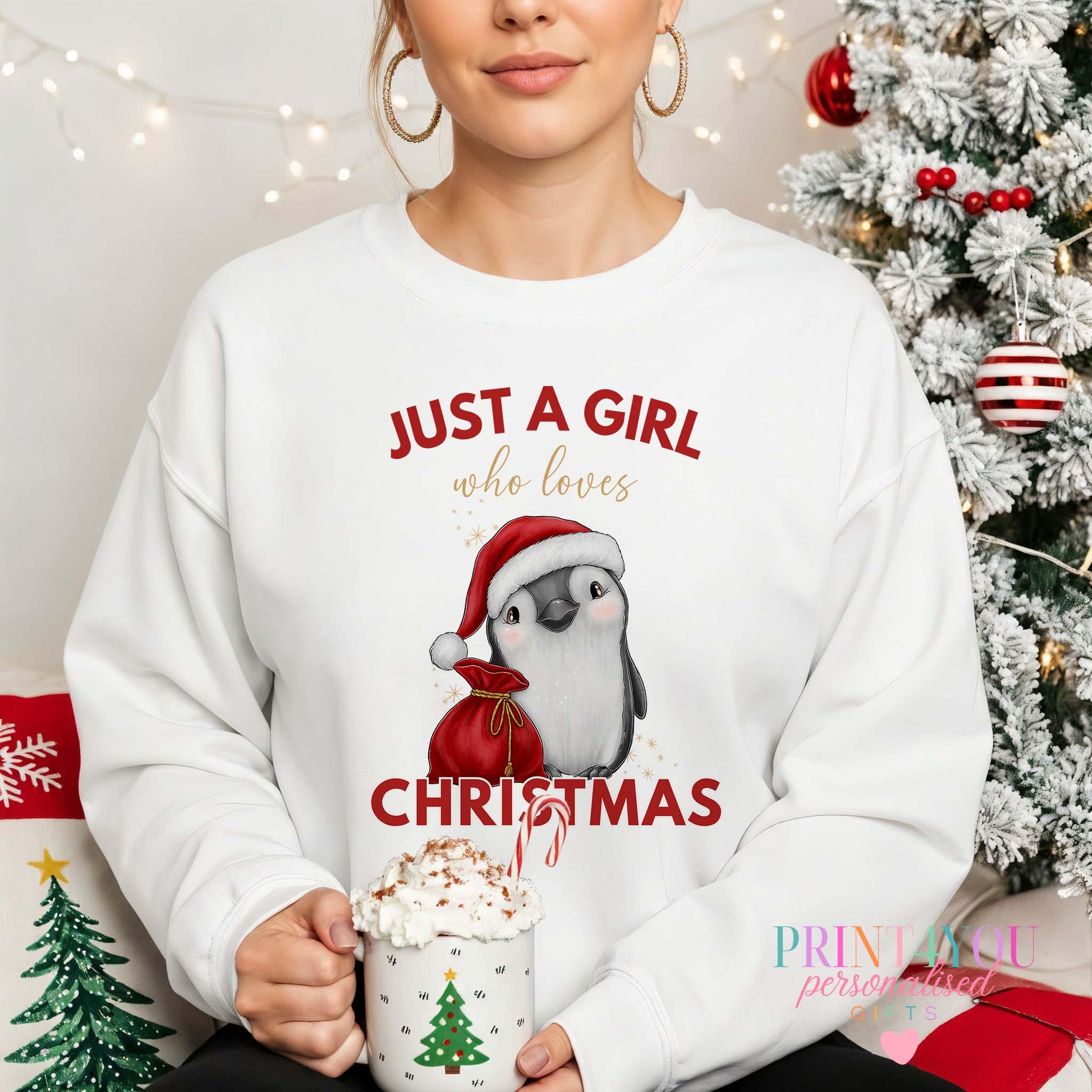 Ladies Christmas jumper with penguin in a Santa hat design, X Small