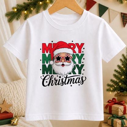 A white t-shirt with a graphic design featuring a Santa Claus face wearing sunglasses and the text "Merry Christmas" in a festive style.