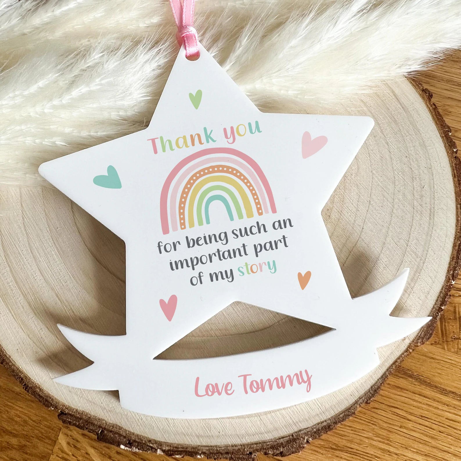 Lifestyle photo of the acrylic thank you star plaque displayed as a gift keepsake