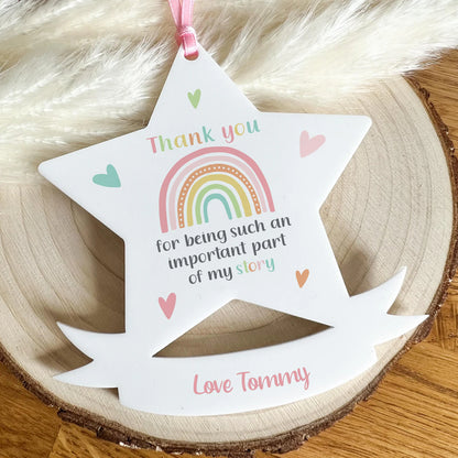 Lifestyle photo of the acrylic thank you star plaque displayed as a gift keepsake