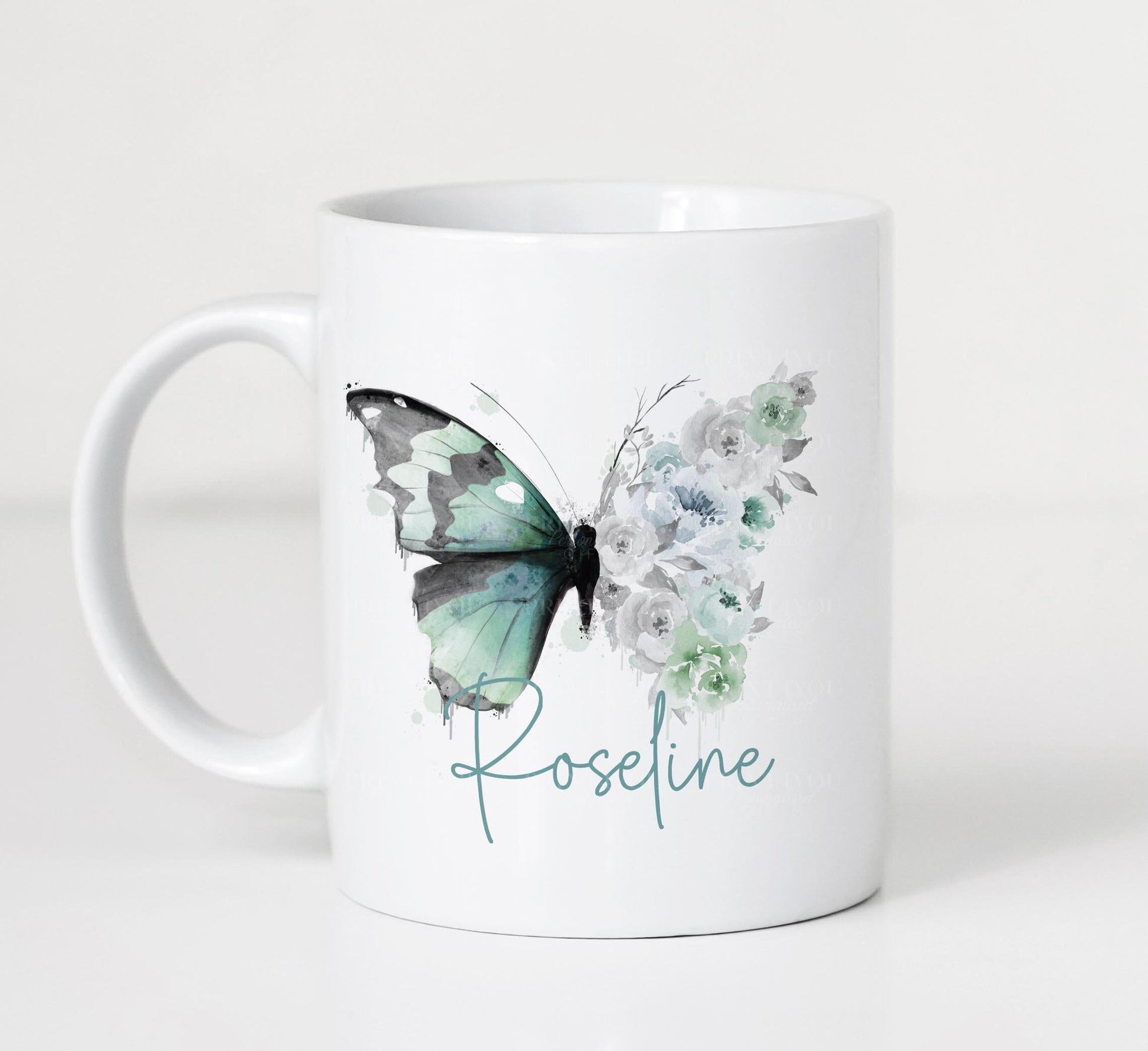 Personalised white ceramic mug with green floral butterfly design and custom name