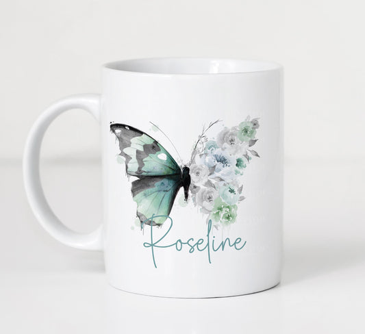 Personalised white ceramic mug with green floral butterfly design and custom name