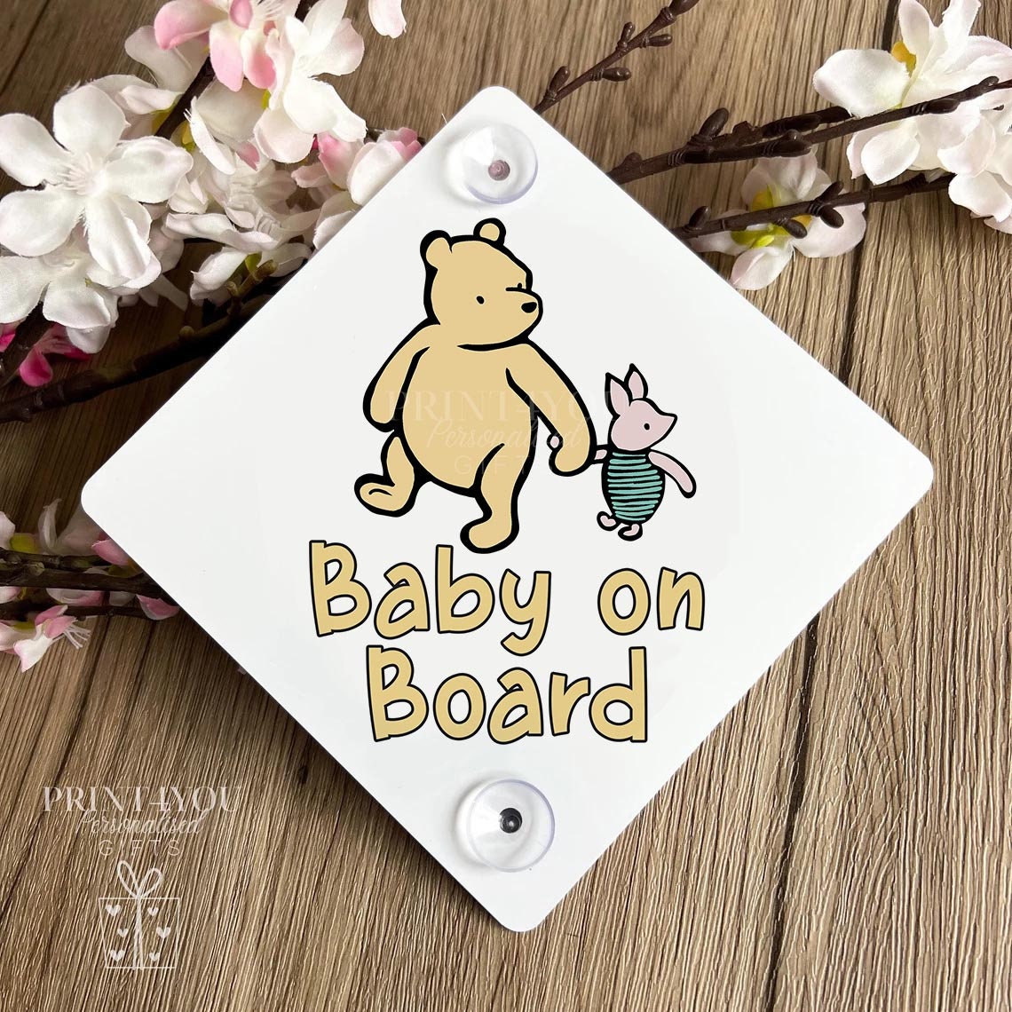 Baby on board aluminium car window sign with suction cups attached, bear and piglet design