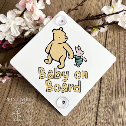 Baby on board aluminium car window sign with suction cups attached, bear and piglet design