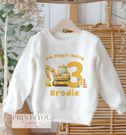 Personalised Digger Birthday Jumper, Birthday Sweatshirt for Children, Any Age Diggin Being, Builder Construction Digger Design - 6-12m