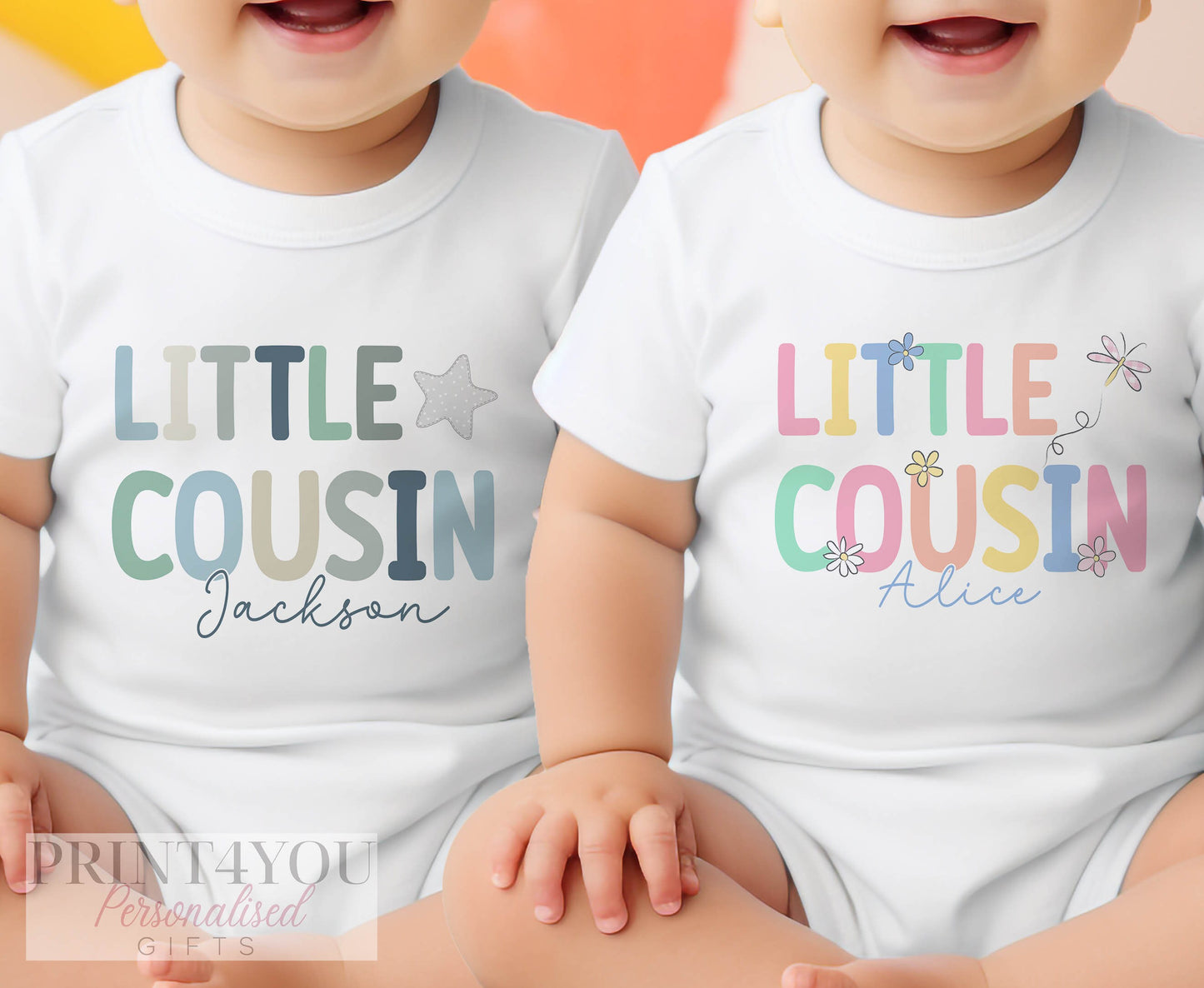 Range of personalised little cousin baby garments including vest, sleepsuit and bib.