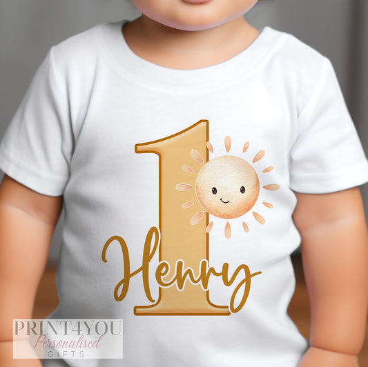 Personalised Sunshine and Rainbow first birthday bib with a custom name and sunshine design.