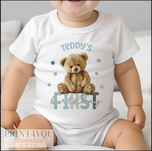 Personalised teddy bear first birthday bib, printed with a custom name.