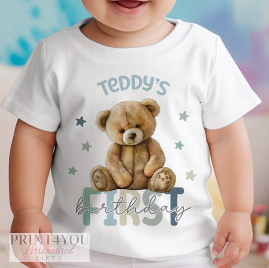 Personalised teddy bear first birthday bib with a bold number one and baby's name printed on soft cotton.