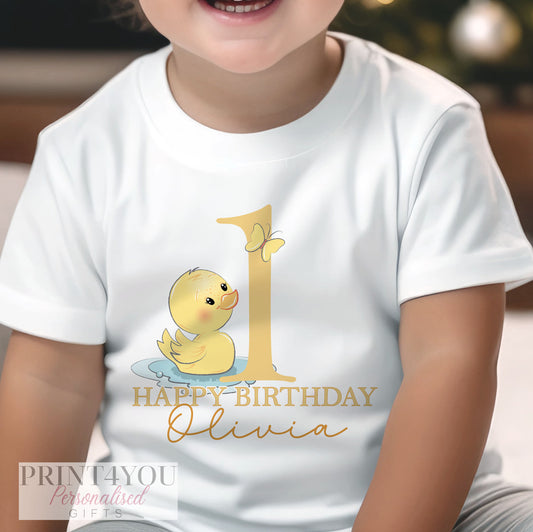 Personalised yellow rubber duck first birthday bib with the baby's name printed on soft cotton.