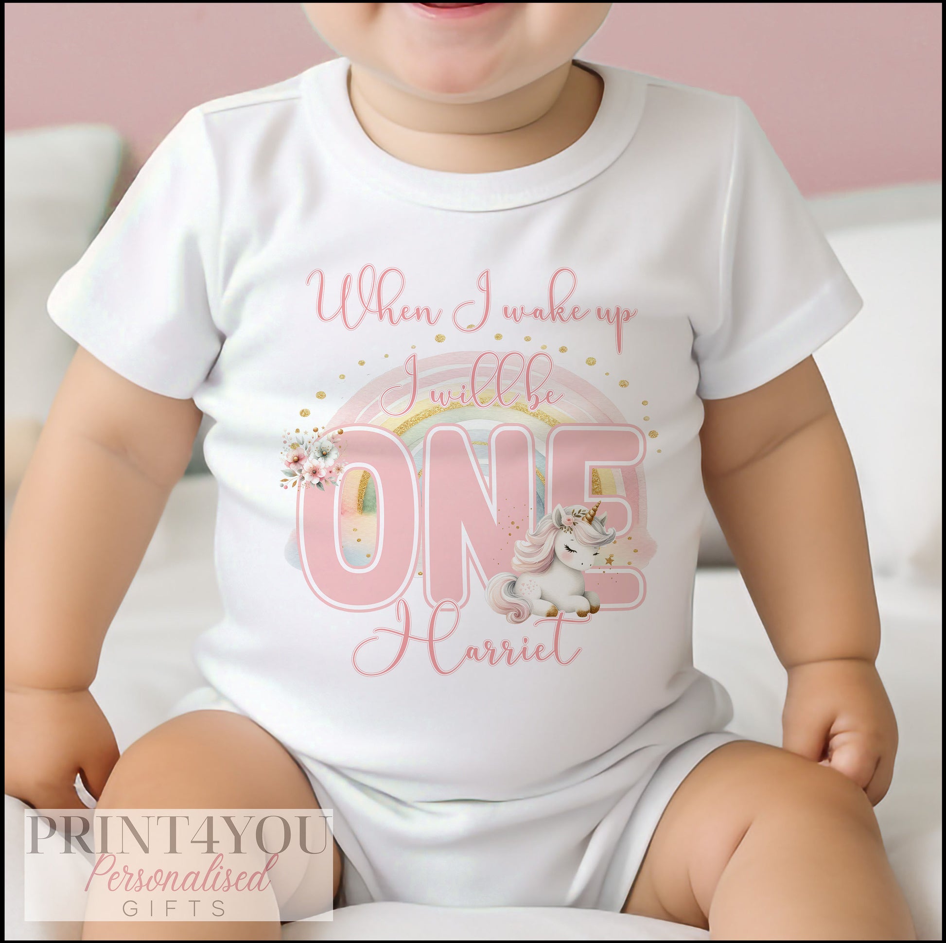 Personalised unicorn rainbow sleepsuit printed with the 'When I Wake Up I Will Be One' first birthday design.