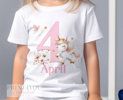 Close-up of the sparkly unicorn birthday t-shirt print showing the design and personalisation detail.