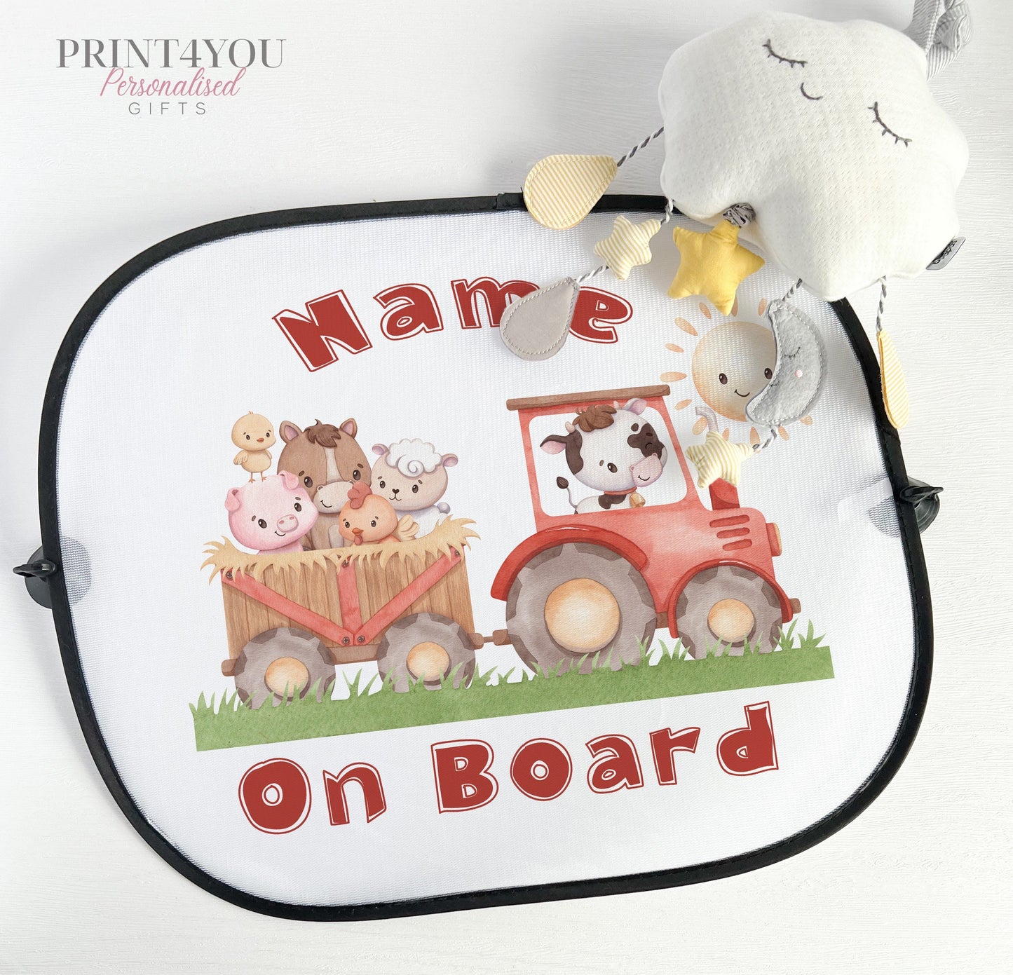 Personalised car sun shade with a tractor and farm animals design and baby on board wording