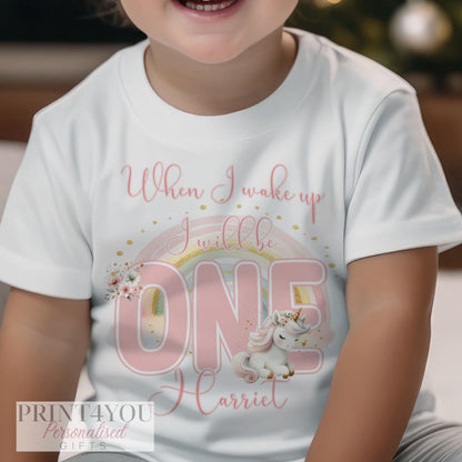 Close-up of the unicorn and rainbow print showing the personalised name detail.