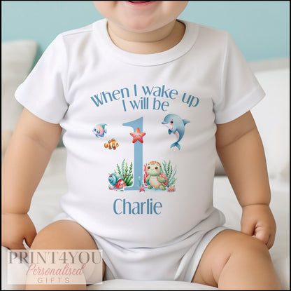 Under the sea personalised first birthday outfit shown as a styled product photo.