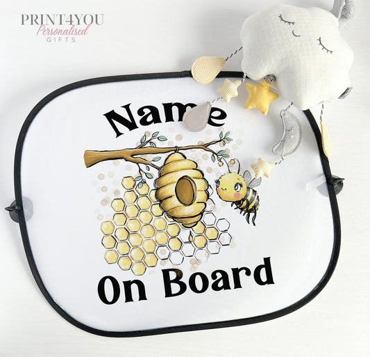Personalised car sun shade with a cute bumble bee design and baby on board wording