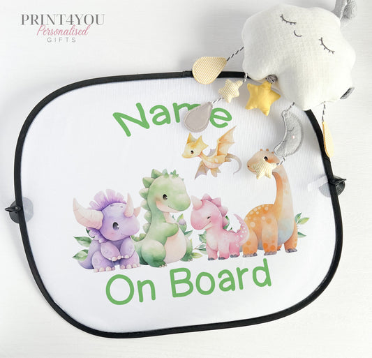 Personalised car window sun shade with a white netted surface, printed with a cute dinosaur design and suction cups for attachment