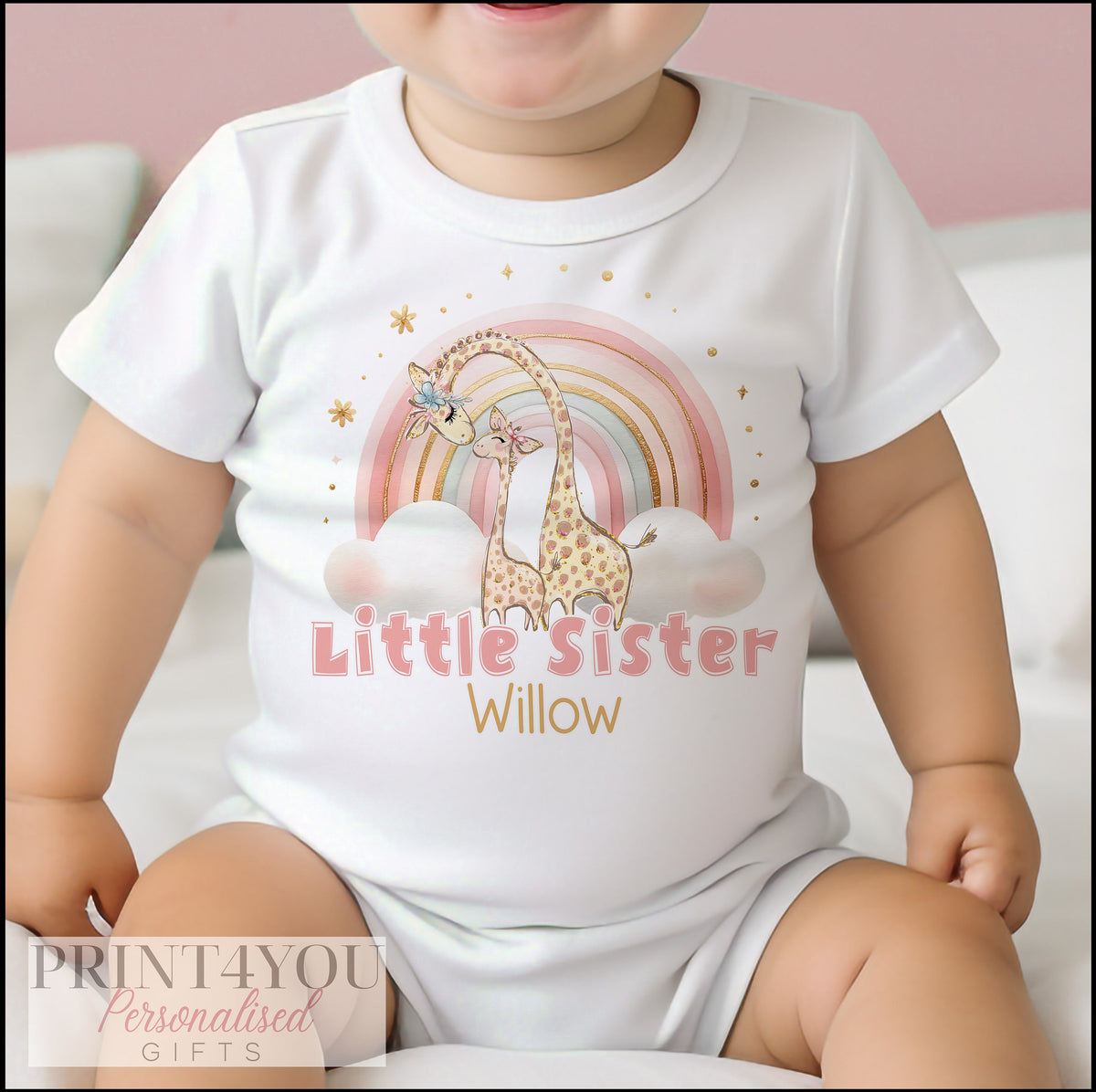 Personalised rainbow giraffe sleepsuit for a new sister gift