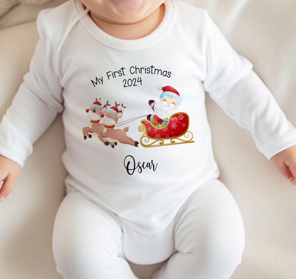 Close-up of the Santa and Reindeer Sleigh first Christmas design personalised with the baby's name.