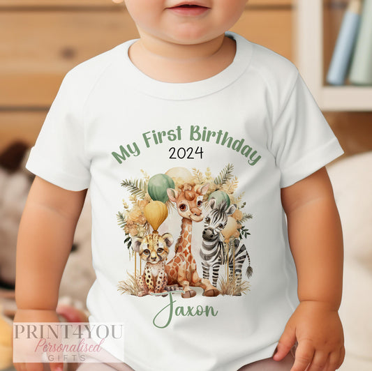 Personalised Boho Safari first birthday t-shirt laid flat showing the safari animal print and name.