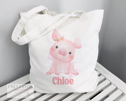Personalised Highland Cow cotton tote bag with custom name print, shown with 67cm carry straps