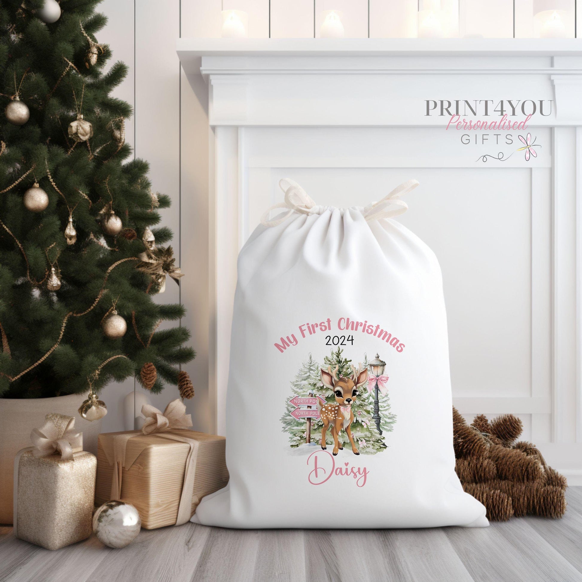 Cream canvas Christmas gift sack personalised with a custom name, drawstring closure detail