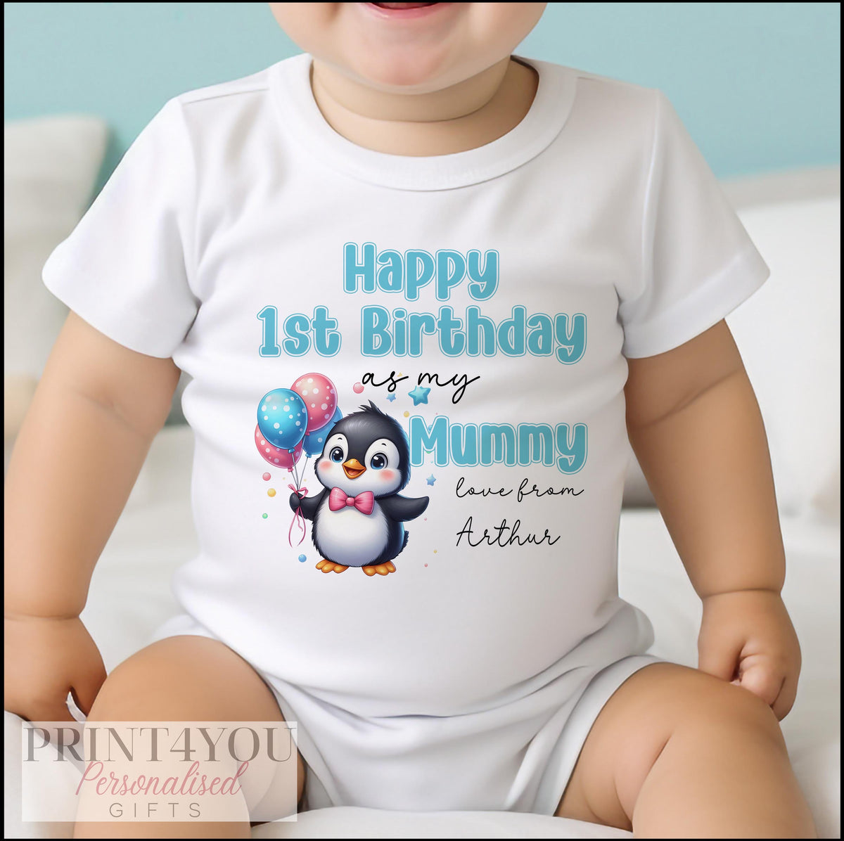 Personalised baby vest printed with Happy Birthday and a chosen name