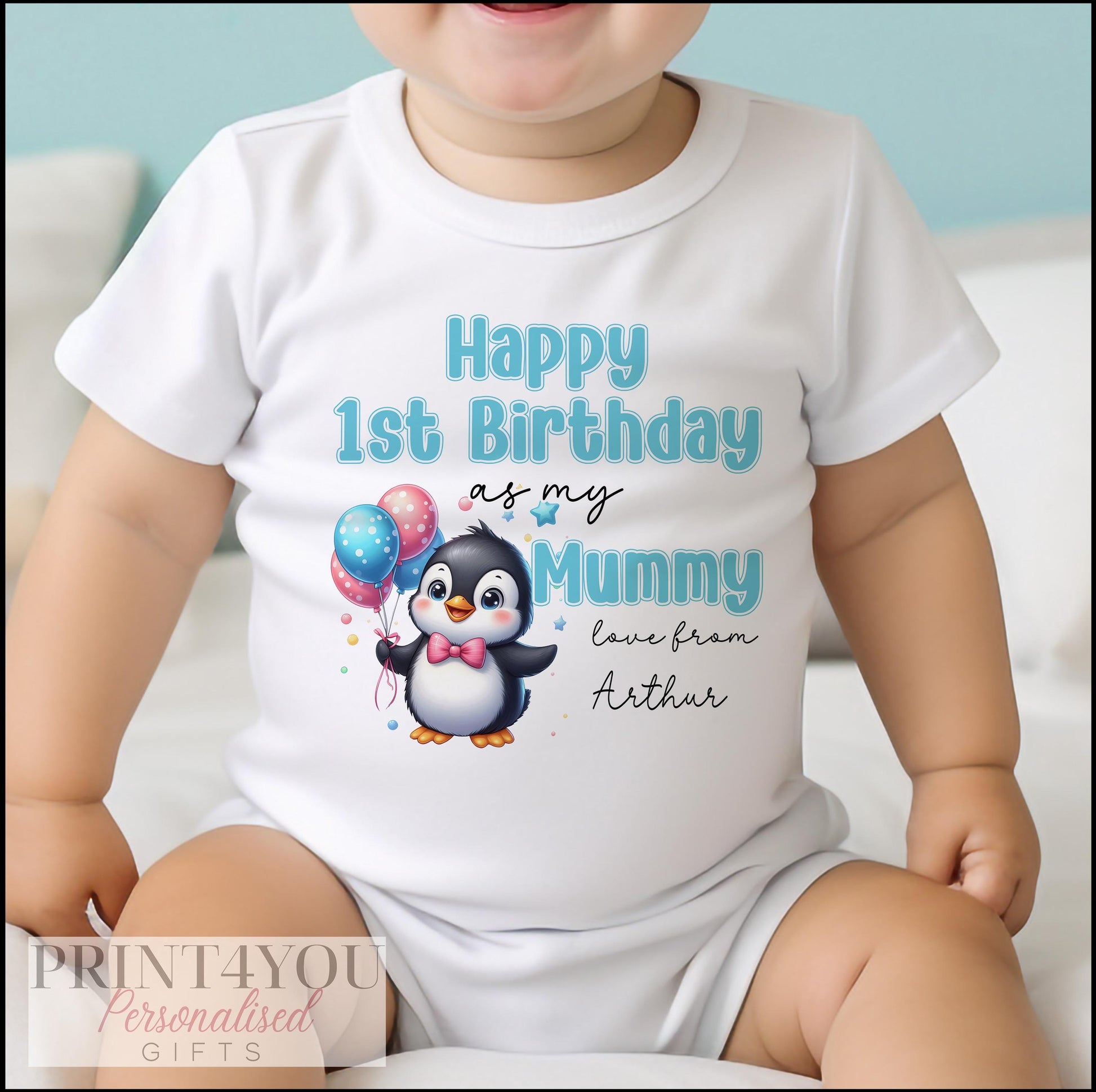 Personalised baby vest printed with Happy Birthday and a chosen name