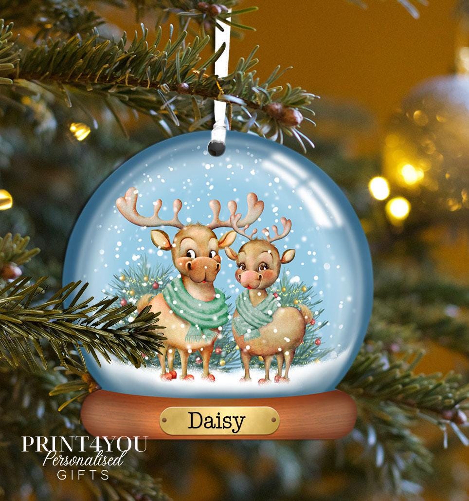 Personalised acrylic Christmas bauble featuring a Reindeer Boy design, personalised with the name Charlie