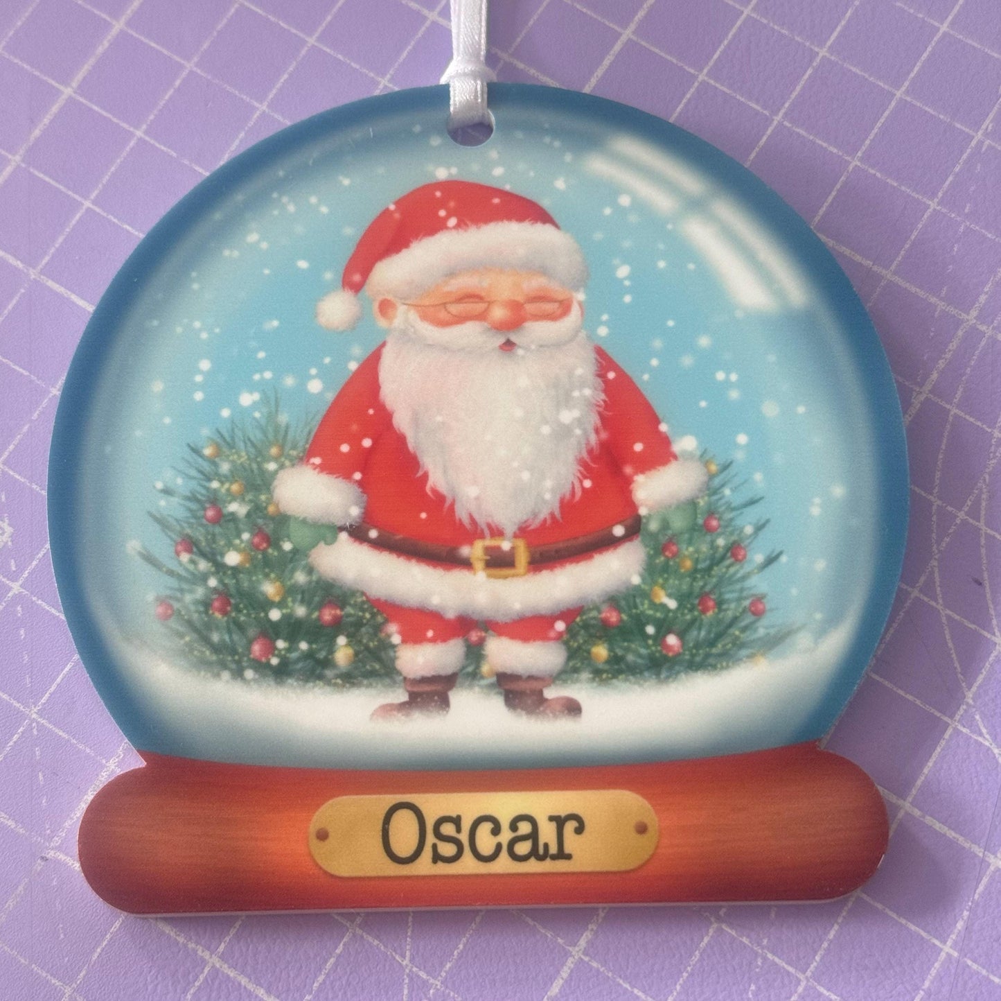Personalised acrylic Christmas bauble shown with optional gift box upgrade, Snowman design