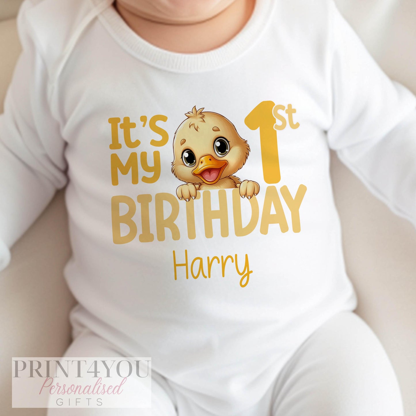 Personalised yellow duck birthday vest in soft white cotton, customised with a bold birthday number.