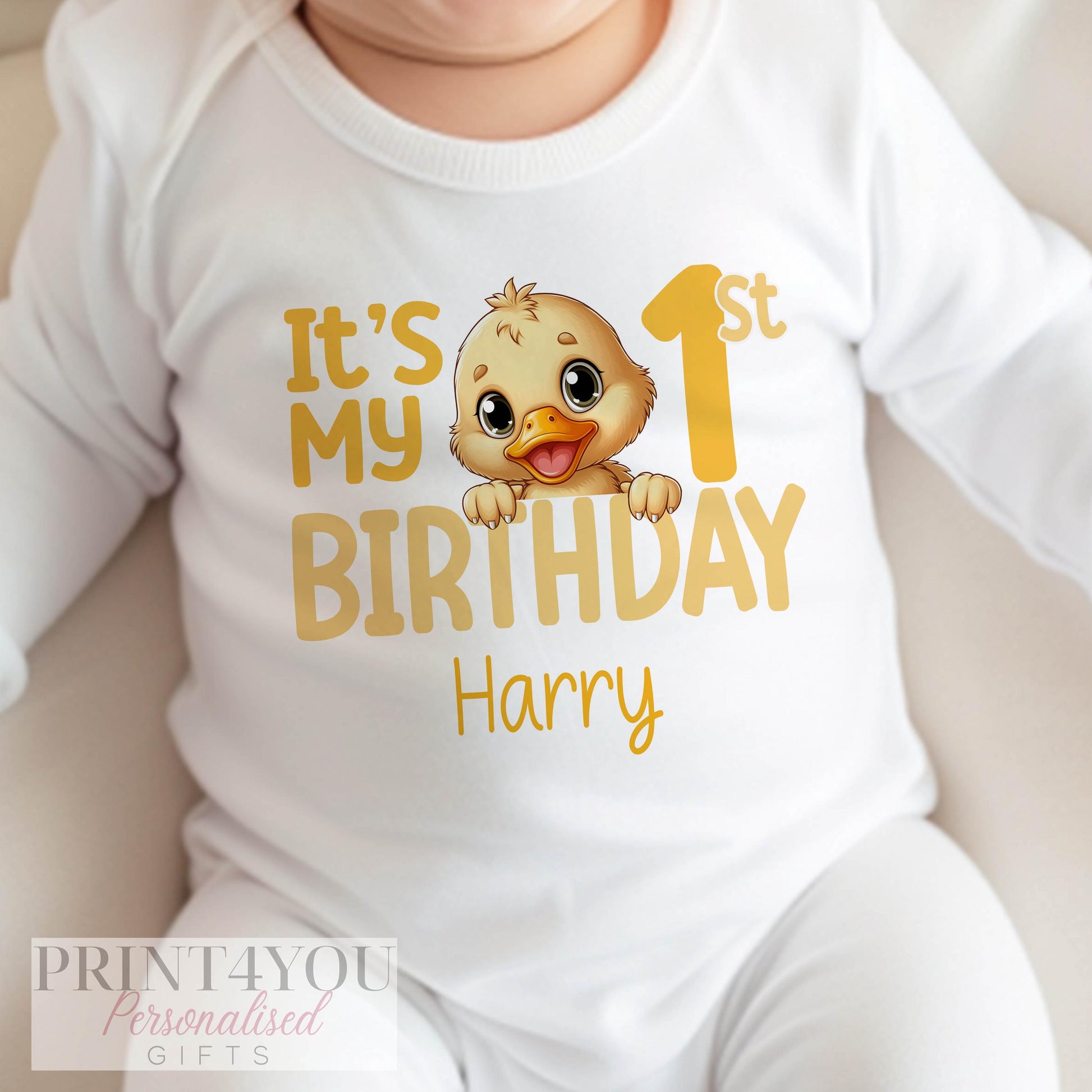 Personalised yellow duck birthday vest in soft white cotton, customised with a bold birthday number.