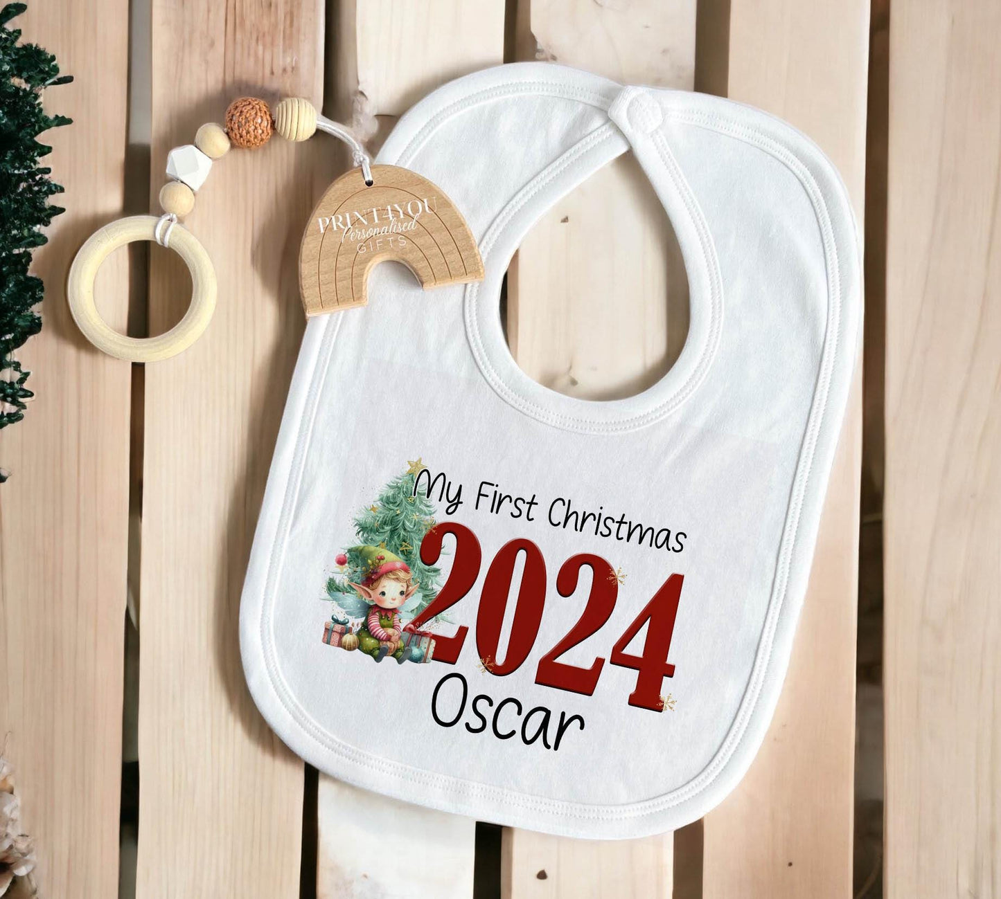 Personalised first Christmas elf design T-shirt for baby.