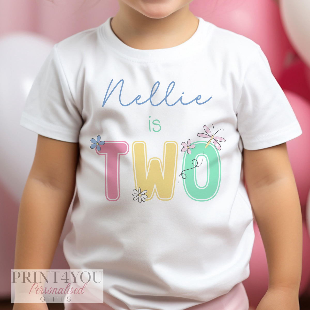 Personalised girls birthday t-shirt, white cotton with pastel daisy design, front view