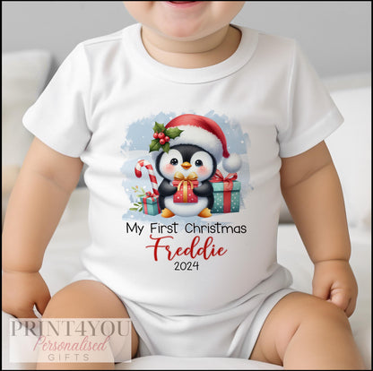 Personalised first Christmas penguin design vest, printed with baby's name.