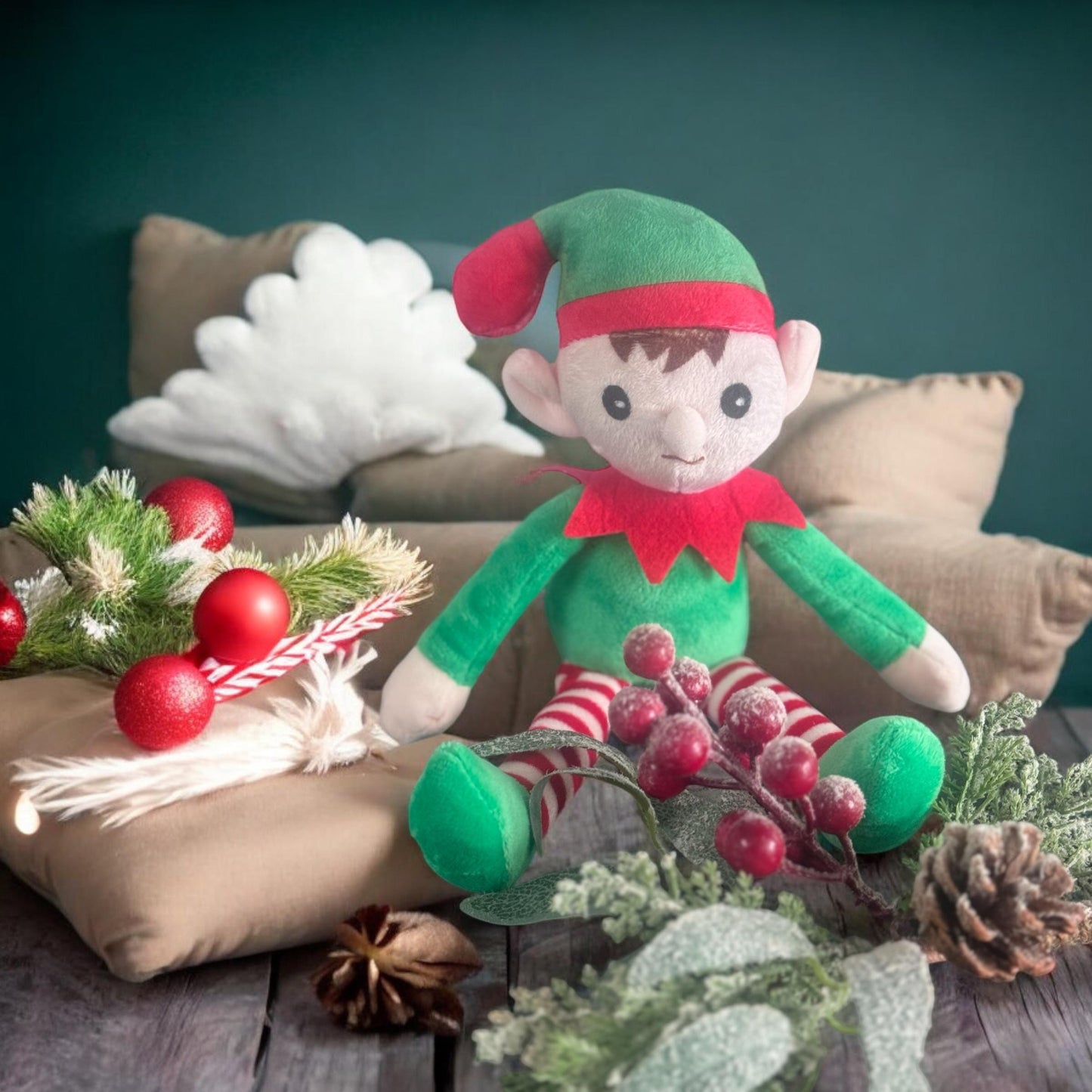 Personalised elf Christmas cushion printed with a custom name and festive elf design