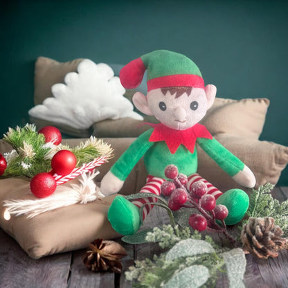 Personalised elf Christmas cushion printed with a custom name and festive elf design