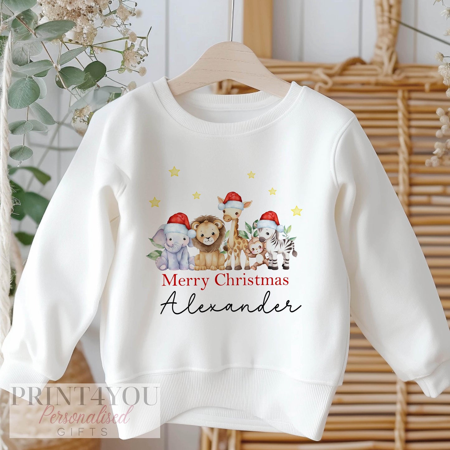 White Christmas jumper with safari animal print and personalised name, size 6-12 months