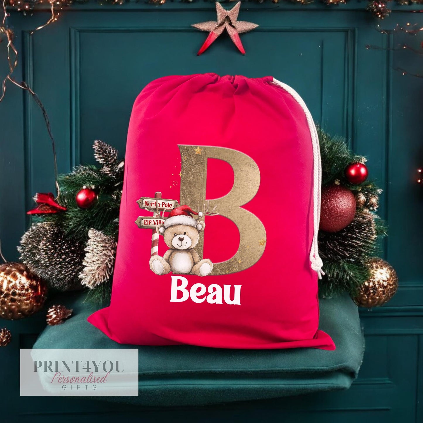 Close-up of the personalised name print on the red Reindeer and Teddy Bear Christmas sack