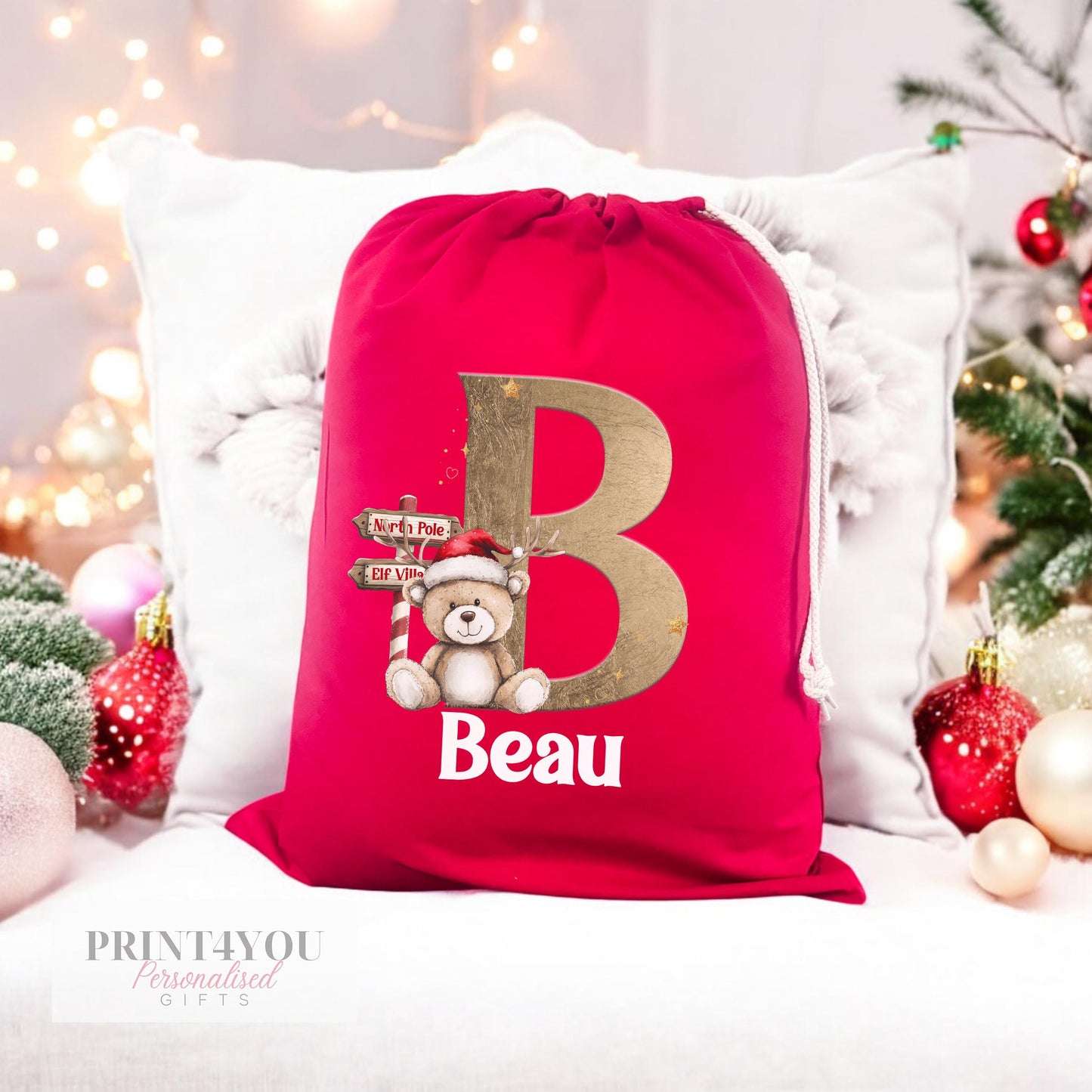 Personalised Christmas sack laid flat showing the full Reindeer and Teddy Bear artwork and drawstring top