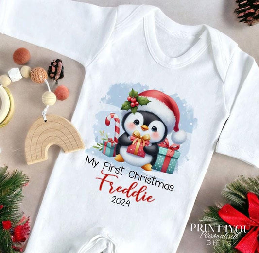 Personalised first Christmas penguin design bib in soft white cotton.