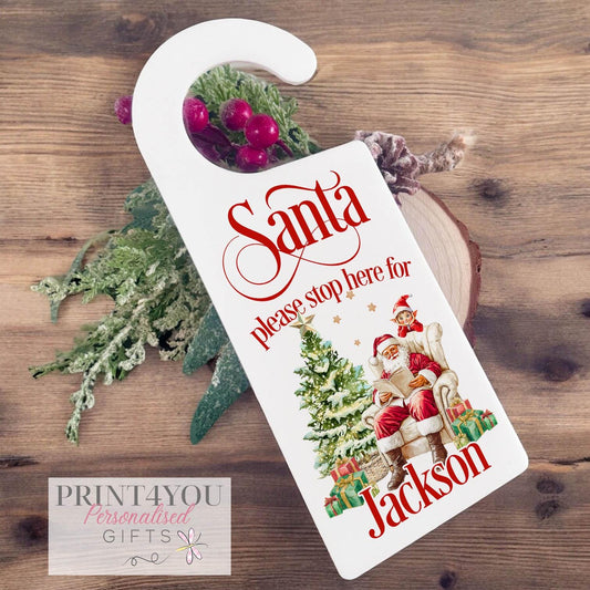 Personalised Santa Stop Here acrylic door hanger featuring an elf design and a child's custom name