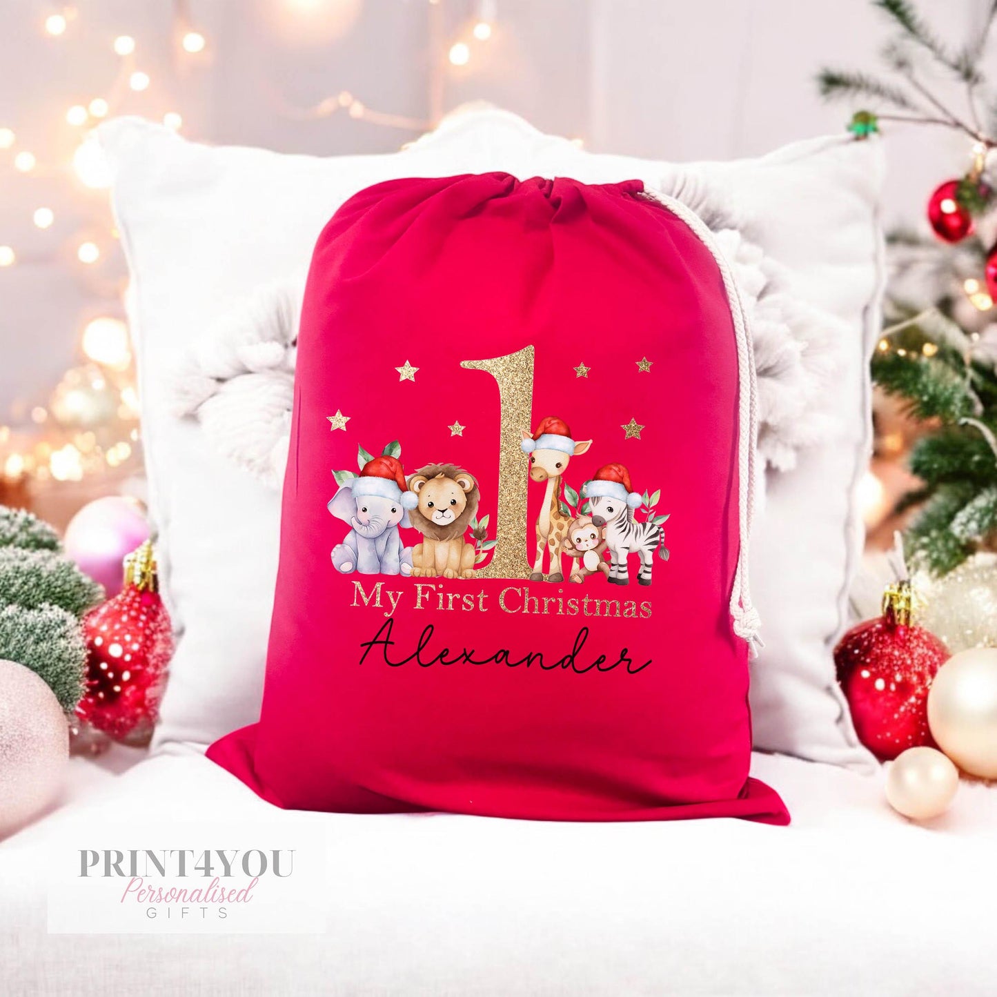 Personalised red Christmas santa sack with Safari Animals design and custom name printed on the front, drawstring closed