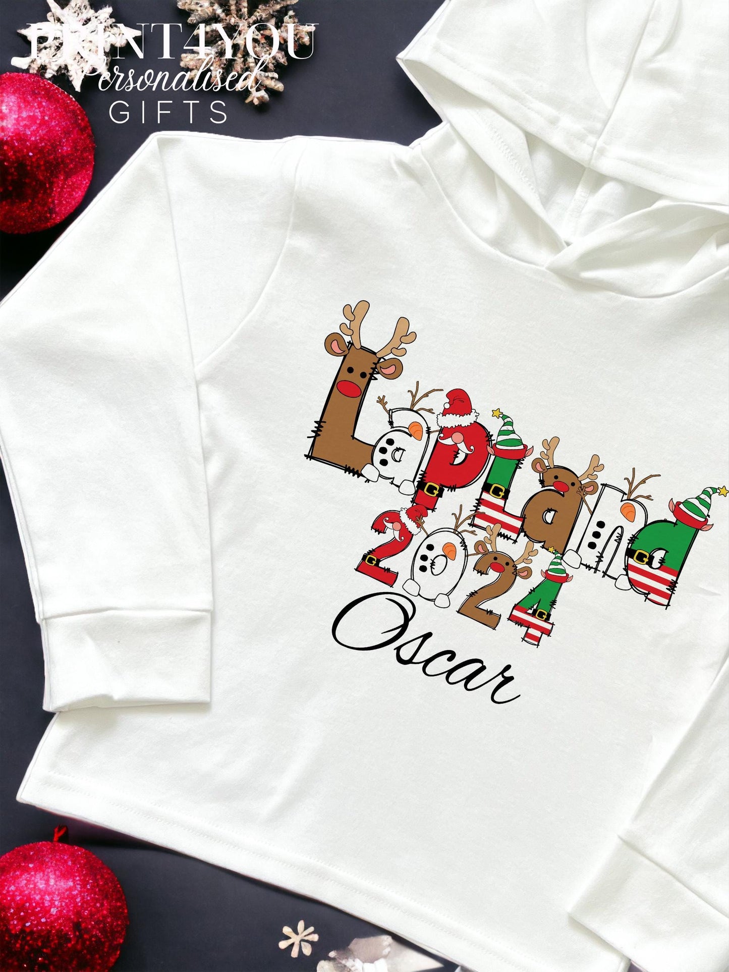 Personalised Lapland Christmas hooded top with custom name, long-sleeve cotton jersey, size 1-2 years