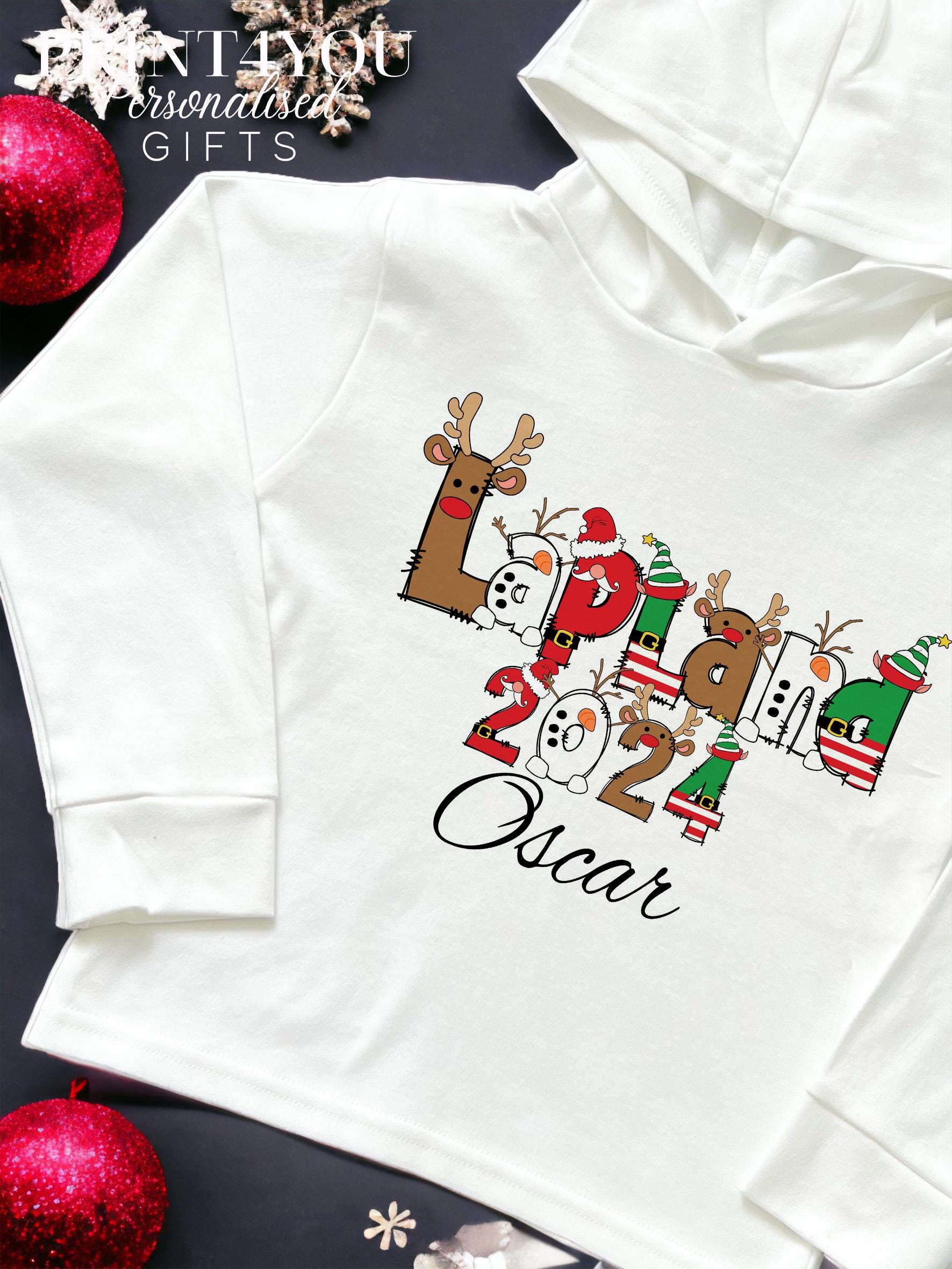 Personalised Lapland Christmas hooded top with custom name, long-sleeve cotton jersey, size 1-2 years