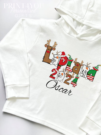 Personalised Lapland Christmas hooded top with custom name, long-sleeve cotton jersey, size 6-12 months